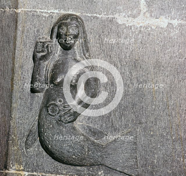 Mermaid on the chancel arch of Clonfert Cathedral, 12th century. Artist: Unknown
