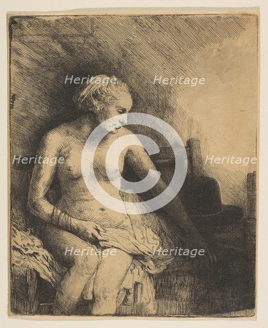 Woman at the Bath with a Hat beside Her, 1658. Creator: Rembrandt Harmensz van Rijn.