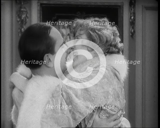 Scene from the Film 'Champagne': The Actress Betty Balfour Embracing the Male Actor Jean..., 1920s. Creator: British Pathe Ltd.