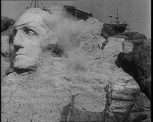 External Shot of Mount Rushmore Showing a Sculpture of American President George Wash..., 1933. Creator: British Pathe Ltd.