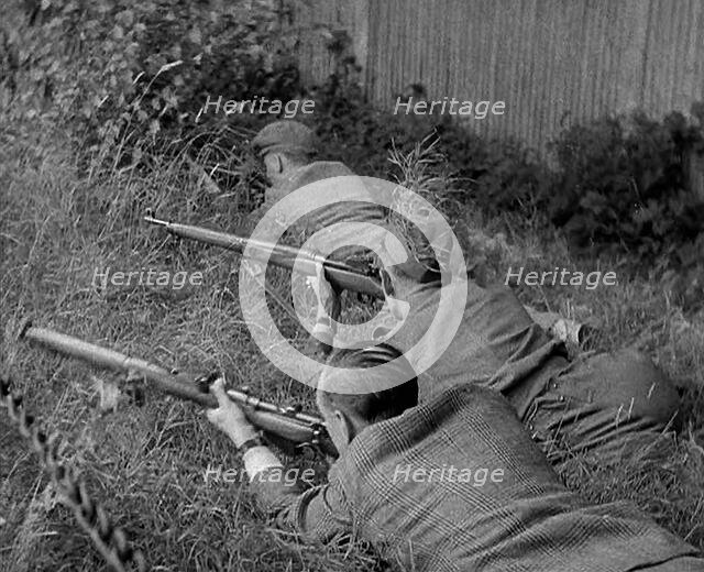 British Local Defence Volunteers Practising Rifle Shooting, 1940. Creator: British Pathe Ltd.