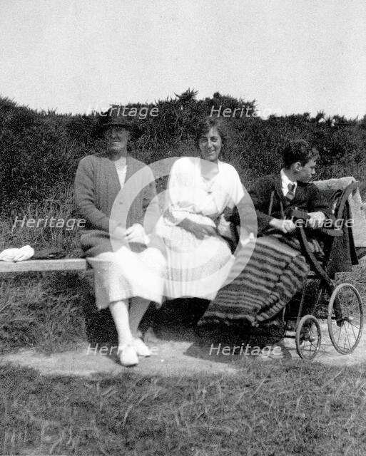A physically disabled boy sitting in a wheelchair,  c1910/1925. Creator: Unknown.