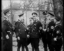 Uniformed Nazis Talking to Each Other, 1933. Creator: British Pathe Ltd.