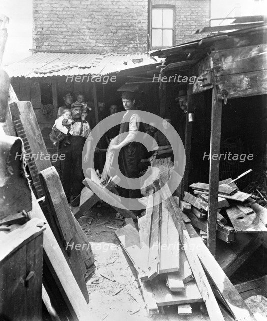 Making firewood from scrap timber, 1900s.  Creator: John Galt.
