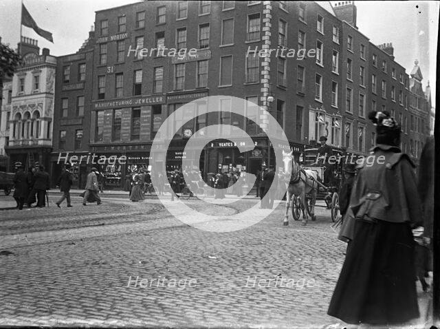 Racine Watch and clock makers building established 1833 (Ireland), 1895. Creator: Robert Augustus Henry L'Estrange.