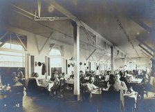 Panama Canal construction workers (American and European) dining in the Isthmian Canal..., c1910. Creator: Unknown.