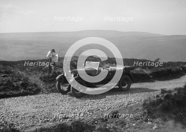 Kitty Brunell road testing a Riley 9 WD tourer, c1930. Artist: Bill Brunell.