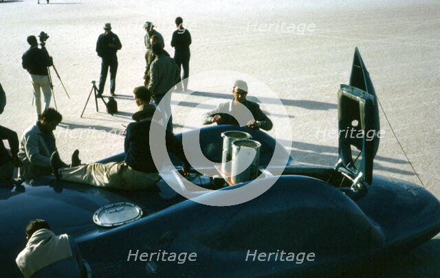 Mechanics working on Bluebird CN7 at lake Eyre for World Land speed record attempt, 1964. Creator: Unknown.