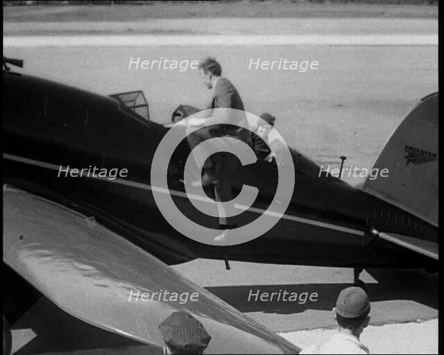 American Aviator Charles Augustus Lindbergh and His Wife Anne Morrow Lindbergh Embarking..., 1930s. Creator: British Pathe Ltd.