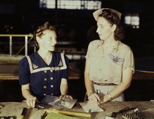Pearl Harbor widows have gone into war work to carry on the fight..., Corpus Christi, Texas, 1942. Creator: Howard Hollem.