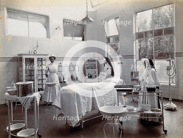 Johannesburg Hospital, South Africa: operating theatre with nun and nurse, c1905. Creator: Unknown.