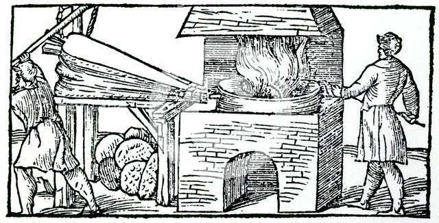 Using bellows to increase the draught in a furnace, 1540. Artist: Unknown
