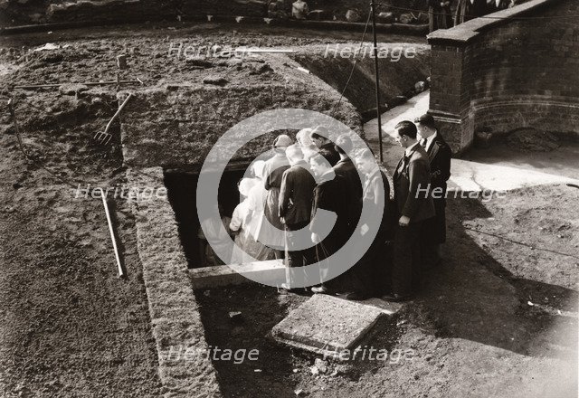 Rowntree employees queue to get into an Air Raid Shelter, York, Yorkshire, 1939. Artist: Unknown