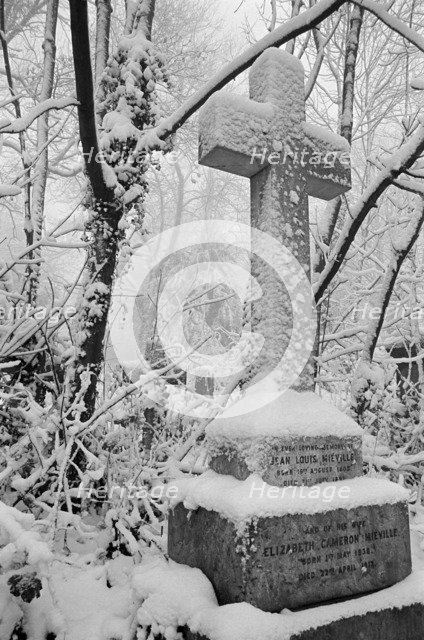 Cross on a grave in Highgate Cemetery, Hampstead, London, c1980-c1984. Artist: John Gay.