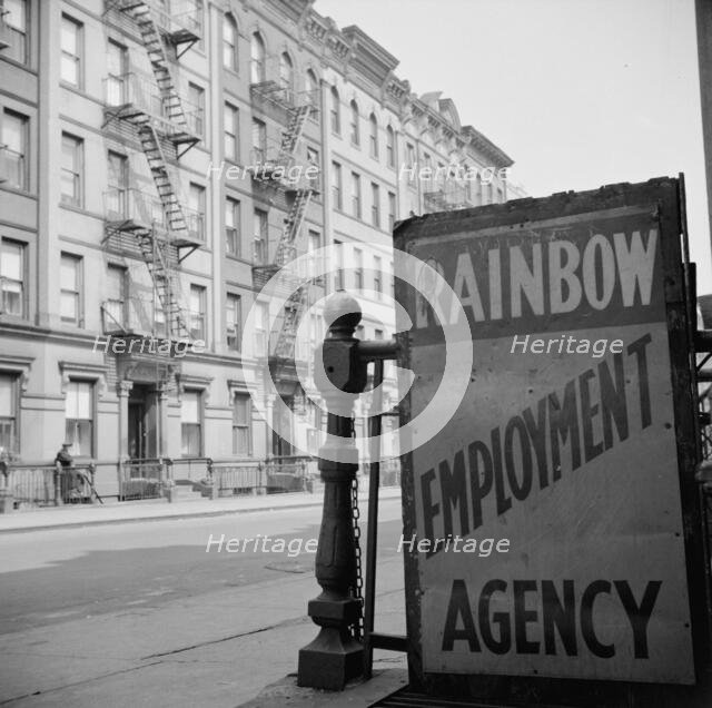One of the numerous employment agency signs in the Harlem area, New York, 1943. Creator: Gordon Parks.