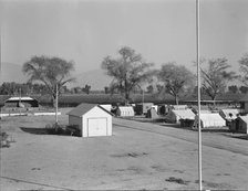 View of Kern migrant camp, community center at left, California, 1936. Creator: Dorothea Lange.
