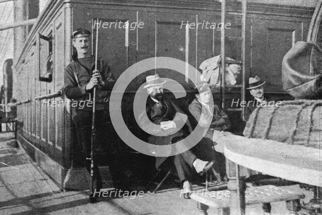 'Le voyage, de Salonique a Toulon, des consuls arretes le 30 decembre; A l'abri du vent..., 1915. Creator: Photographies A.C.