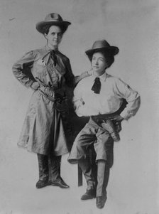 Mrs. Bessie Jenkins and Mrs. Cary Seely dressed up in cowboy outfits, 1910. Creator: Bain News Service.