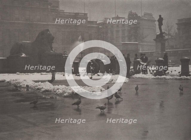 Winter's bite, Trafalgar Square, 1920s. Creator: Harry Moult.