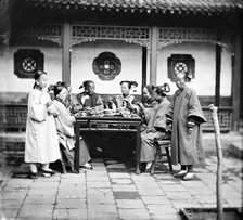 Peking, Pechili province, China: Manchu ladies at a meal table, 1869. Creator: John Thomson.