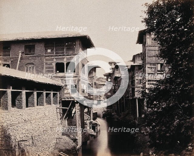 Merchants' houses above the Marqual canal, Kashmir, India, c1860s. Creator: Samuel Bourne.