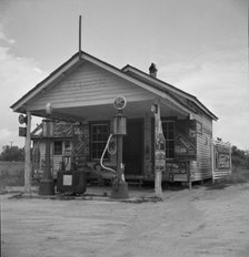 Country filling station owned and operated by tobacco farmer, Granville County, North Carolina, 1939 Creator: Dorothea Lange.