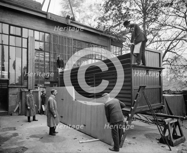 Aircraft manufacturing, Waring and Gillow factory, Hammersmith, London, November, 1916. Artist: Adolph Augustus Boucher.