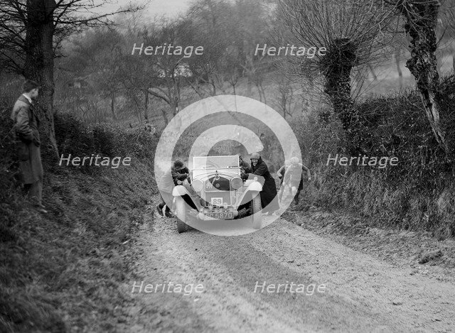Alfa Romeo of KD Evans getting a push at the NWLMC London-Gloucester Trial, 1931. Artist: Bill Brunell.