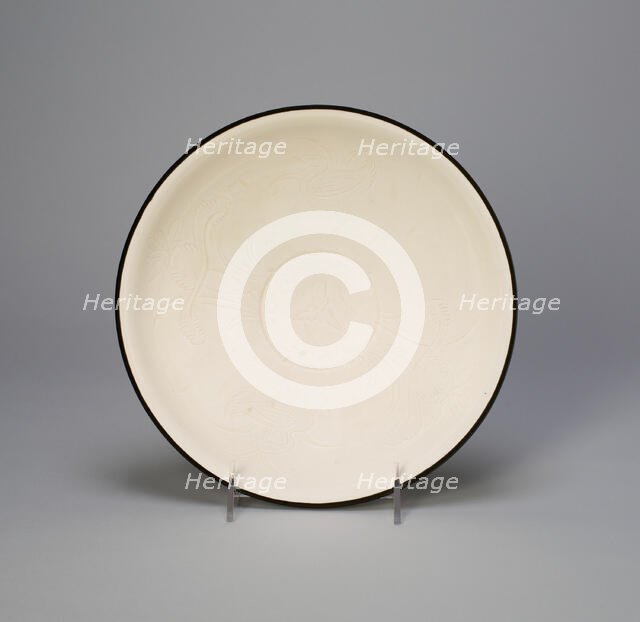 Bowl with Mandarin Ducks in a Lotus Pond, Northern Song dynasty, (960-1127), 11th century. Creator: Unknown.