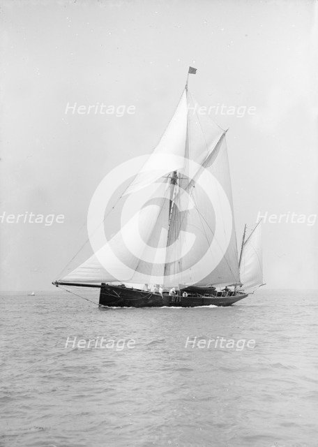The yawl 'Adelaide' under sail, 1913. Creator: Kirk & Sons of Cowes.