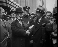 Alfred Emanuel Smith, Governor of New York Being Presented a Case of Beers by Mr Meyer from..., 1930 Creator: British Pathe Ltd.