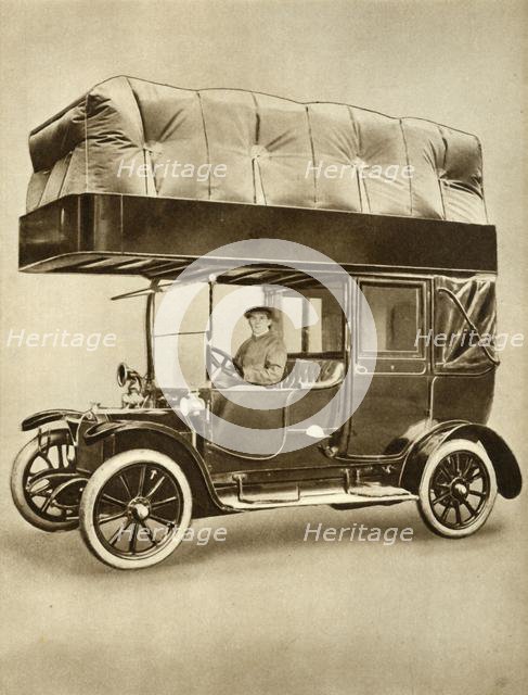 Taxi cab with gas-bag device on specially fitted roof, 1914-1918, (1935). Creator: Unknown.