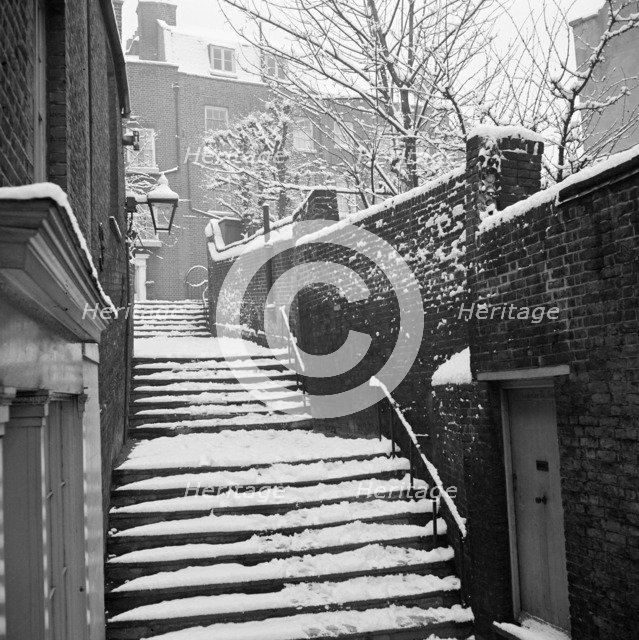 Snow-covered steps, Hampstead, London, 1960-1965. Artist: John Gay