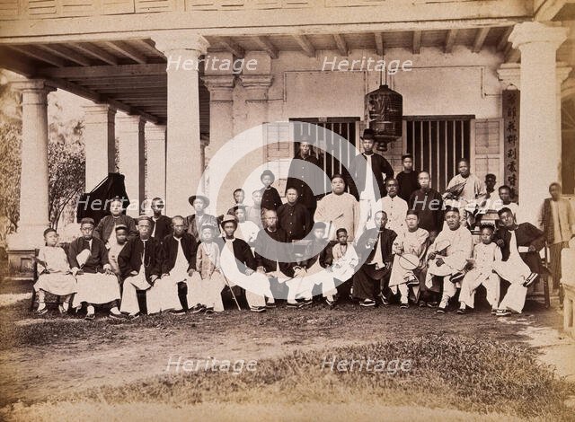 Malaya: Chinese merchants grouped outside their club house on Penang Island, 1881. Creator: John Edmund Taylor.