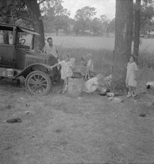 Migrant family from Oklahoma in Texas, 1936. Creator: Dorothea Lange.