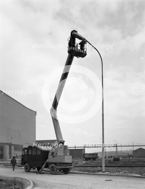 Simon cherry picker, Park Gate Iron & Steel Co, Rotherham, South Yorkshire, 1964.  Artist: Michael Walters