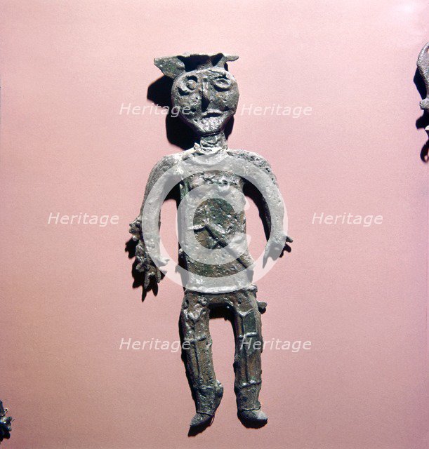 Bronze figure of man from the steppe-lands, USSR. Artist: Unknown.