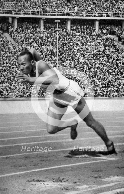Jesse Owens at the start of the 200 metres at the Berlin Olympic Games, 1936. Artist: Unknown
