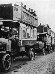 'British troops being moved to a fresh part of the line by motor 'buses', 1915. Artist: Unknown.
