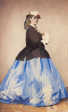 An man in drag posing side-on, 1862. Creator: Unknown.