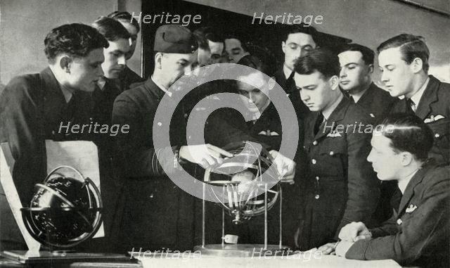 RAF personnel learning navigation during the Second World War, 1941. Creator: Charles Brown.