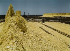 Nearly exhausted sulphur vat from which railroad..., Freeport Sulphur Co, Hoskins Mound, Texas, 1943 Creator: John Vachon.