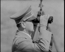 Adolf Hitler, the German Leader Looking Through Binoculars at Army Manoeuvres, 1937. Creator: British Pathe Ltd.