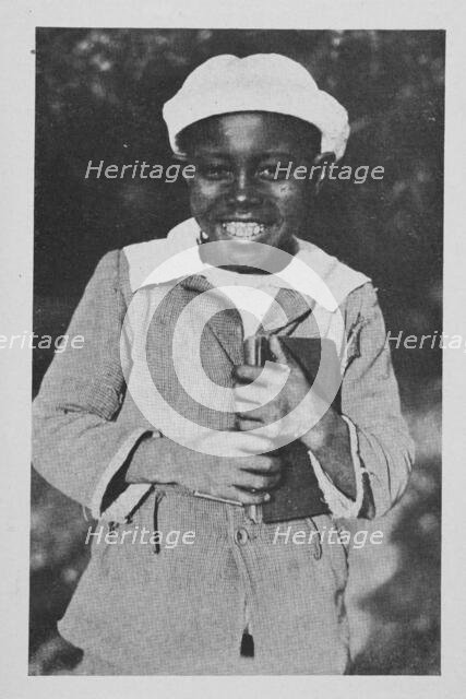 An African American boy; The lost pocketbook, 1922. Creator: Unknown.