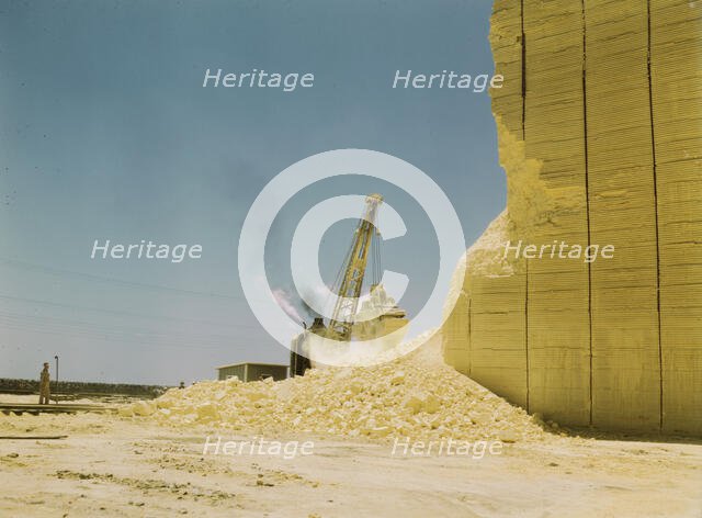Loading sulphur from vat, Freeport Sulphur Co., Hoskins Mound, Texas, 1943. Creator: John Vachon.