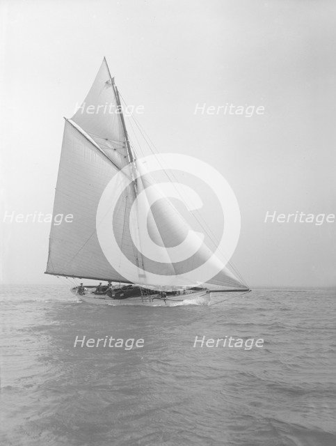 The cutter 'Grisette' sailing close-hauled, 1913. Creator: Kirk & Sons of Cowes.