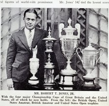 Bobby Jones (1902-72), American golfer, with Grand Slam trophies, 1930. Artist: Unknown