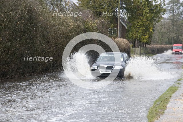 Skoda driving fast through floodwater at Beaulieu 2008. Artist: Unknown.