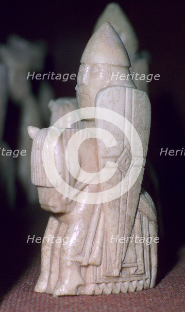 A Knight - The Lewis Chessmen, (Norwegian?), c1150-c1200. Artist: Unknown