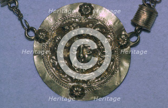 Gold Roman Gorgon's head pendant. Artist: Unknown
